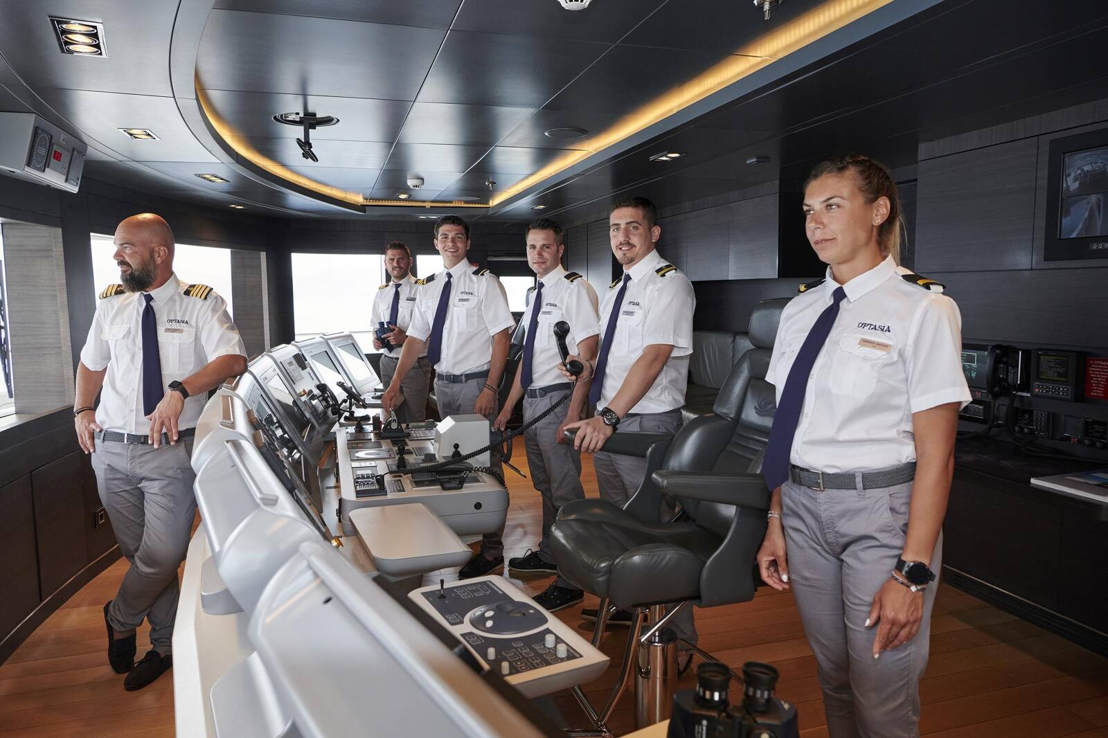 Crew at work on the bridge of a superyacht
